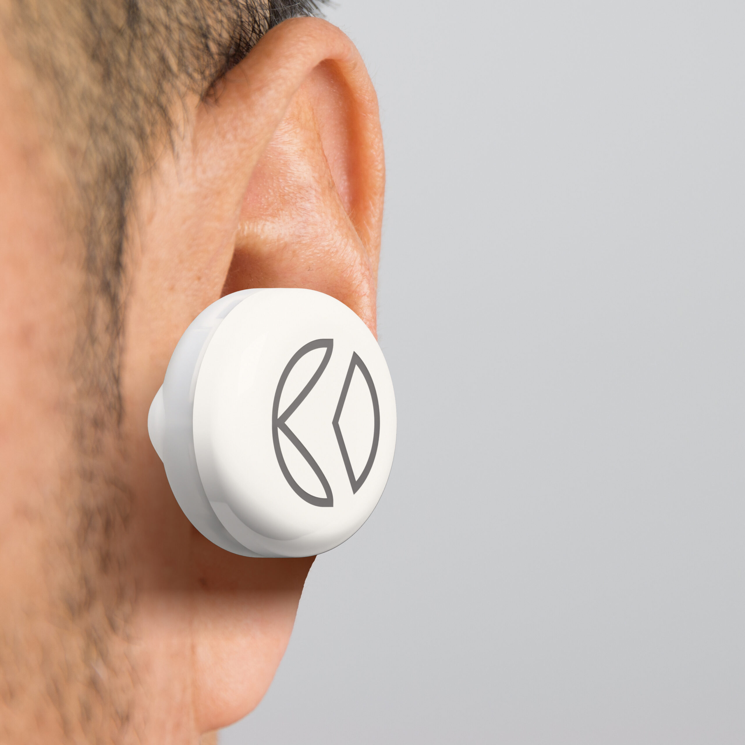 Man wearing the Vagal Oh! on his ear, side profile