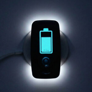 Vagal Buddy tVNS charging wirelessly in low light showing battery level