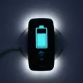 Vagal Buddy tVNS device charging on wireless pad showing battery indicator at 71 percent with blue glow